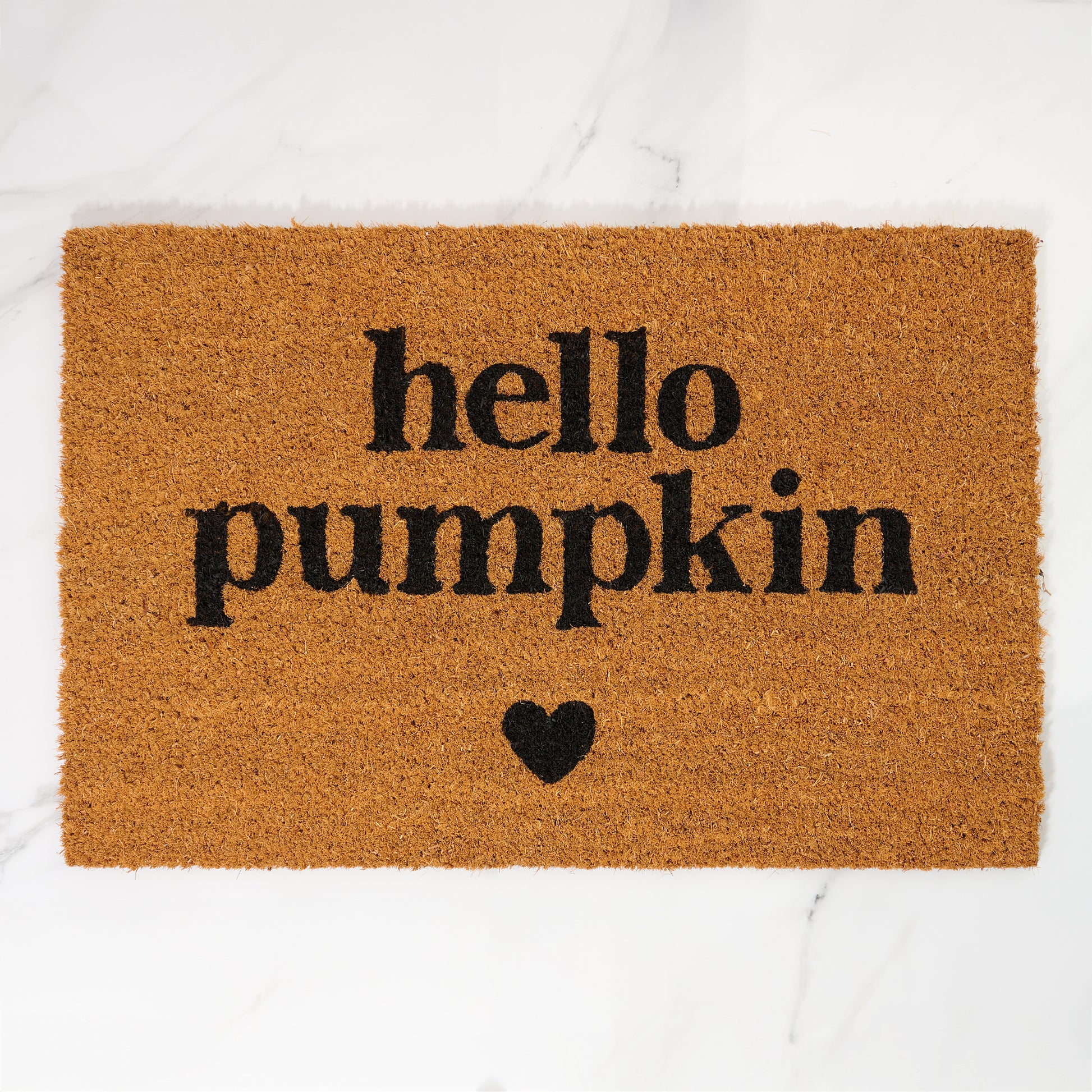 Doormat with 'hello pumpkin' text and a heart on a white background
